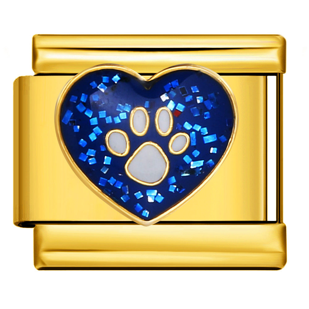 Gold Blue Glitter Paw Print Heart Italian Charm featuring a white paw print outlined in gold inside a navy blue glitter heart on a gold Italian charm link.