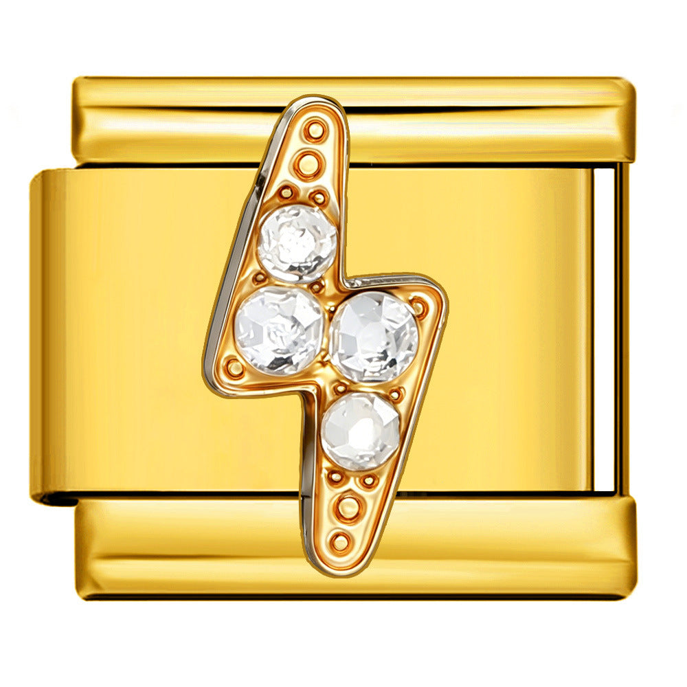 A gold-toned Italian charm link featuring a gold-toned lightning bolt motif adorned with four clear faceted crystals