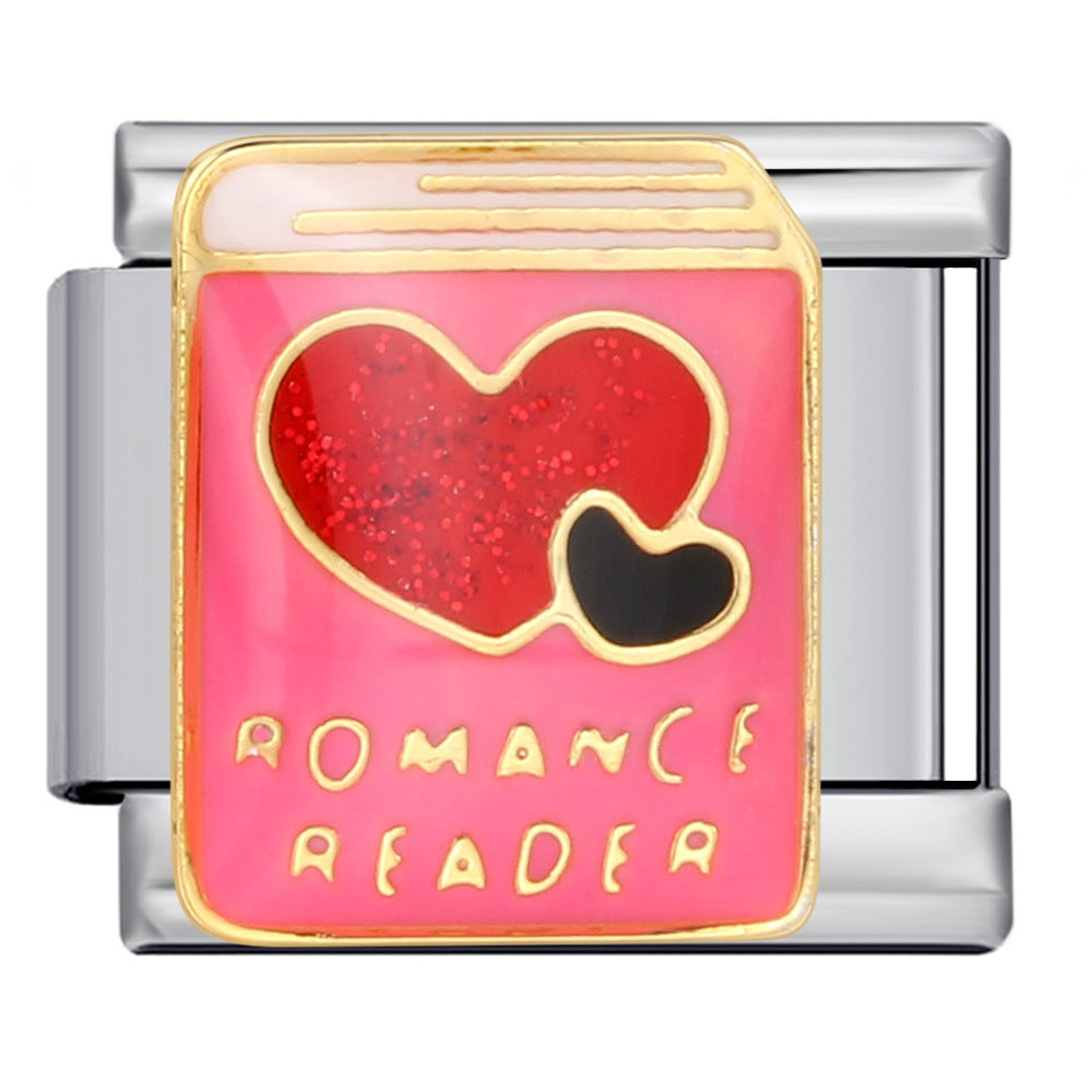 Silver-toned charm link with a hot pink book with glittery red and black hearts and gold details with letters saying 'ROMANCE READER'.