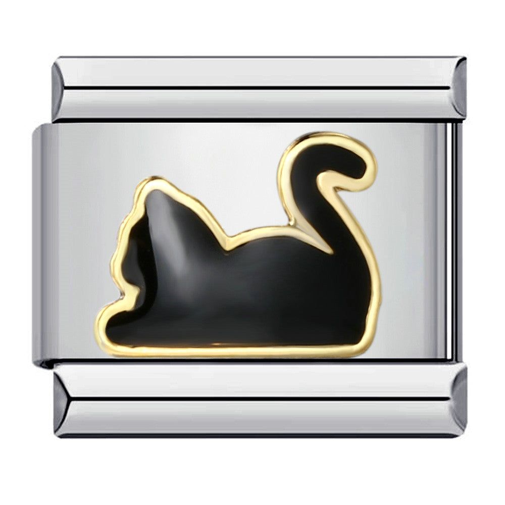 A silver charm with a black cat laying down with a gold outline