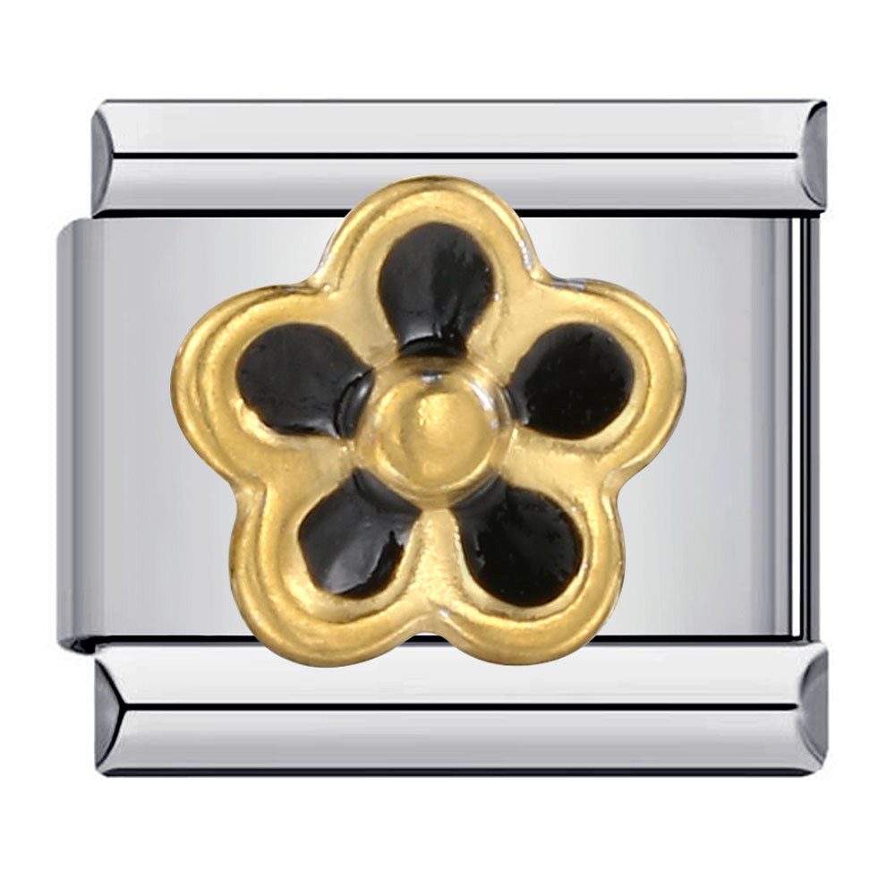 Silver-toned charm with a gold and black flower design