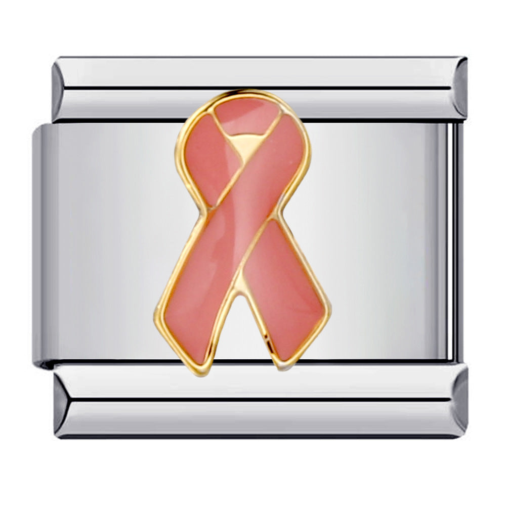 A silver-toned Italian charm link featuring a glossy pink enamel awareness ribbon with a gold-plated border
