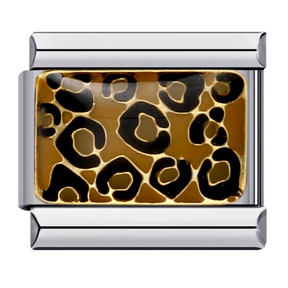 Silver toned modular charm with a brown cheetah print on it