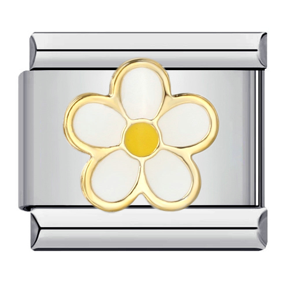 Silver charm with a gold and white flower design