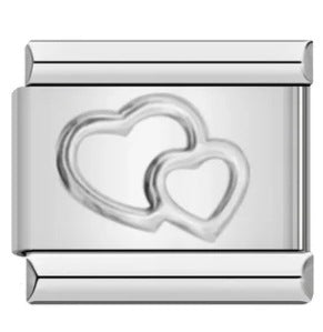 A polished silver-toned rectangular charm link featuring two interlocking heart motifs on the front