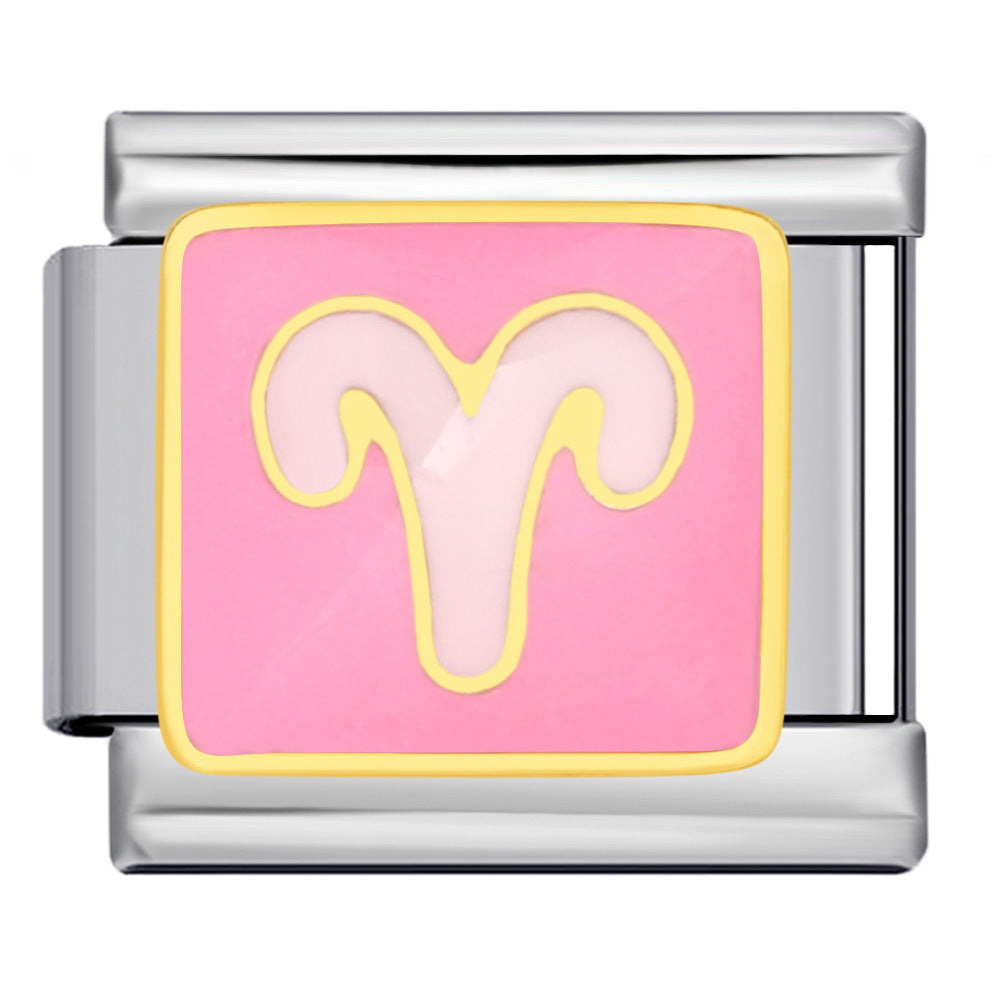 A silver-toned modular charm link featuring a square pink face with a pale pink ram Aries symbol outlined in yellow.