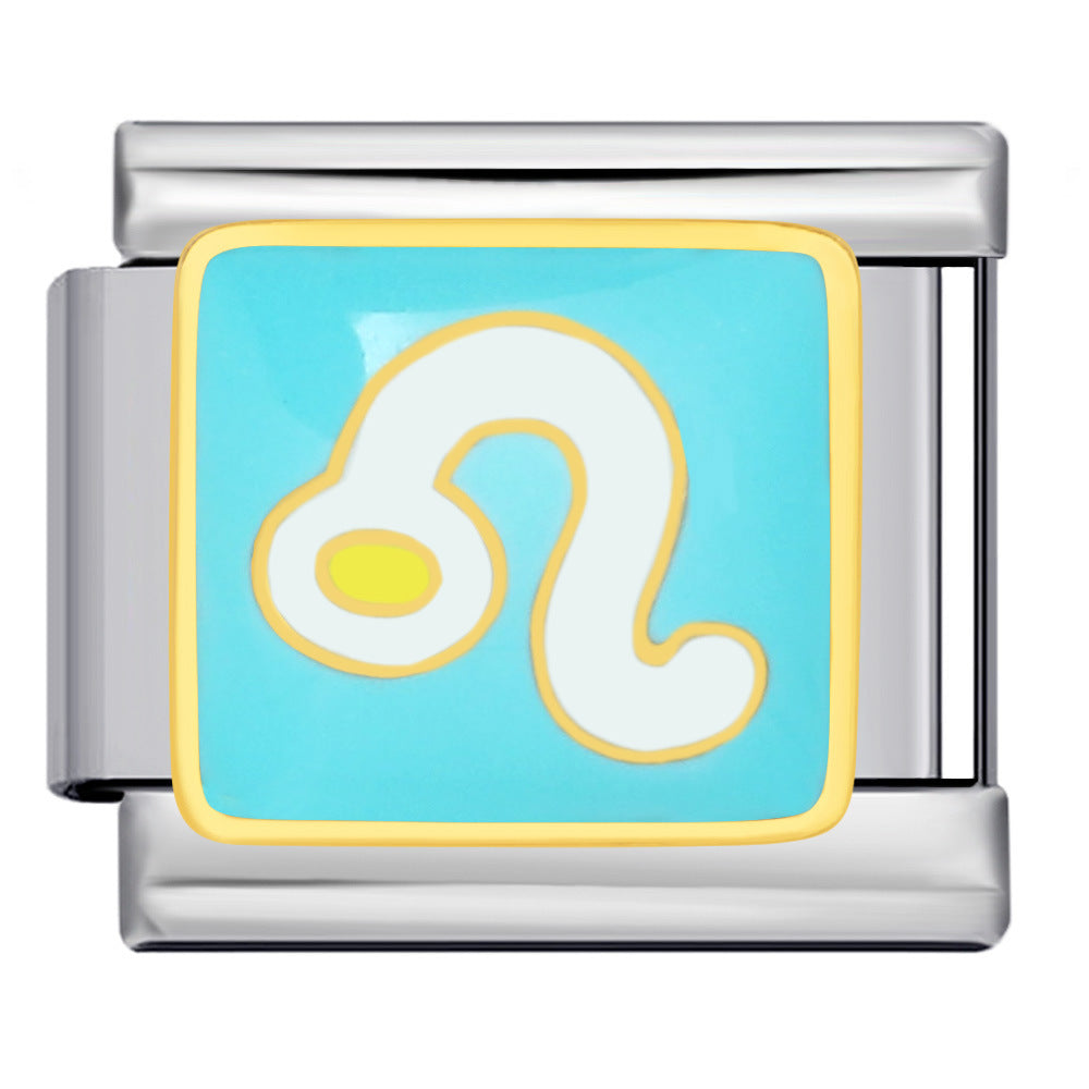 A silver-toned modular charm link featuring a square light blue enamel insert with a white and yellow astrological symbol resembling the Leo zodiac sign.