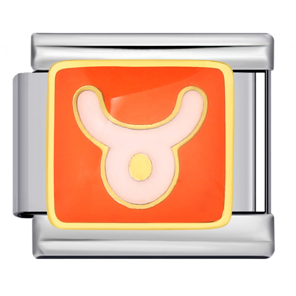 A silver-toned metal charm link featuring an orange square face with a pale pink and gold Taurus Zodiac symbol resembling a bull or ram.