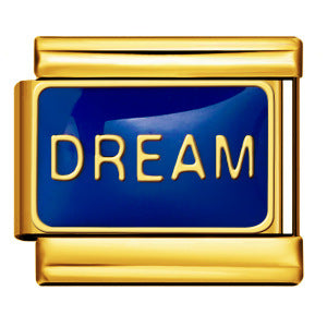 Gold Dream Italian Charm featuring the word DREAM in uppercase gold lettering on a royal blue enamel background.
