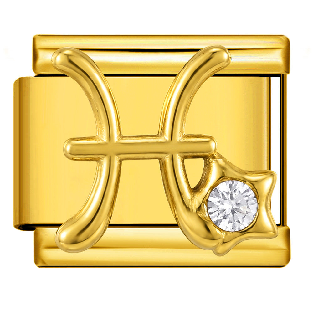 A gold-toned Horary astrology charm link featuring a polished gold Pisces symbol and a small clear round-cut gemstone on a star accent