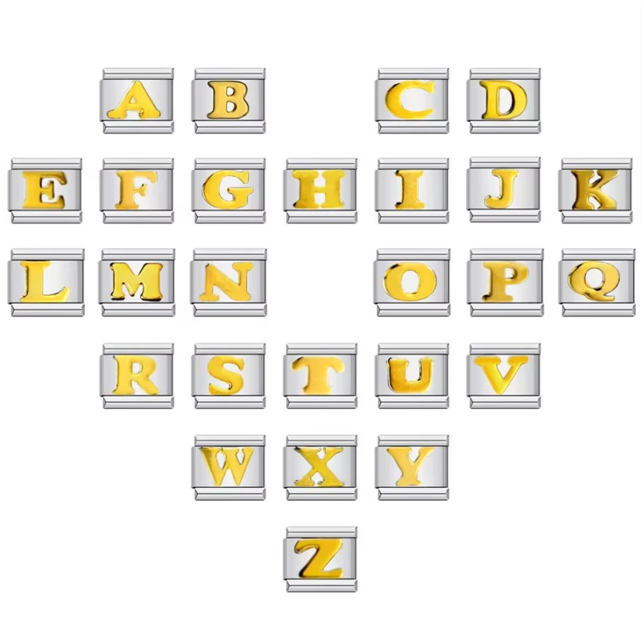 A set of alphabet letter tiles from A to Z, each with a metallic gold letter face and a silver-gray 3D beveled border, arranged in rows