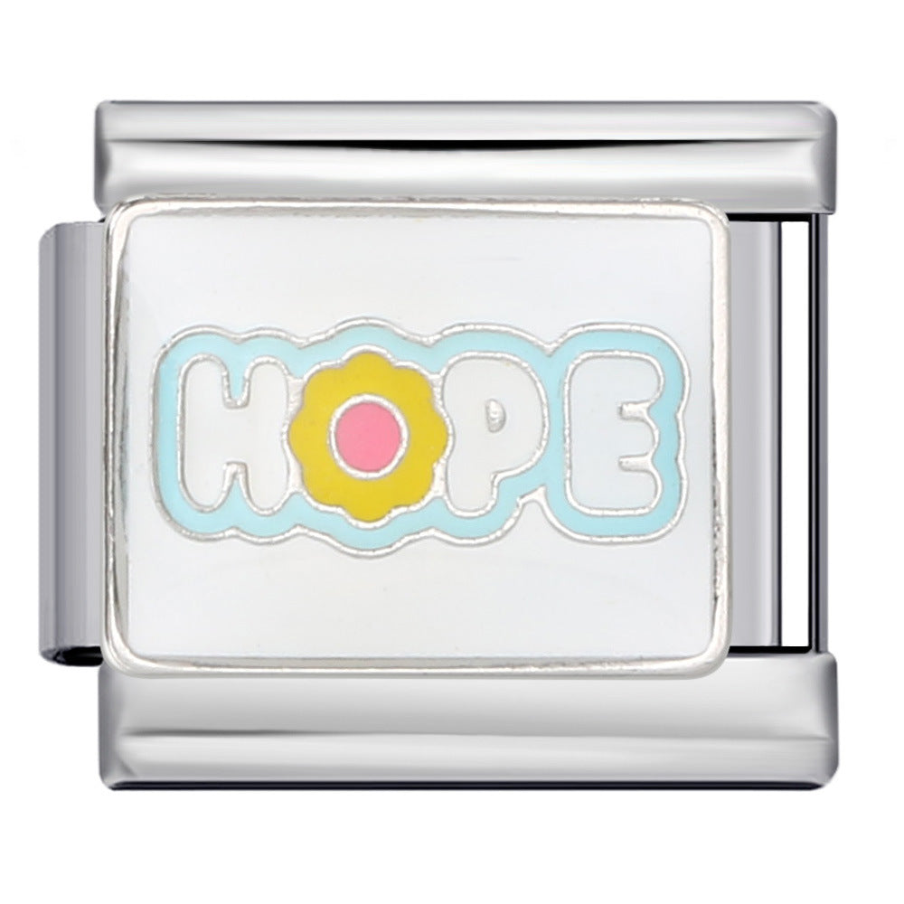 Silver charm with 'HOPE' and a yellow flower on a white background