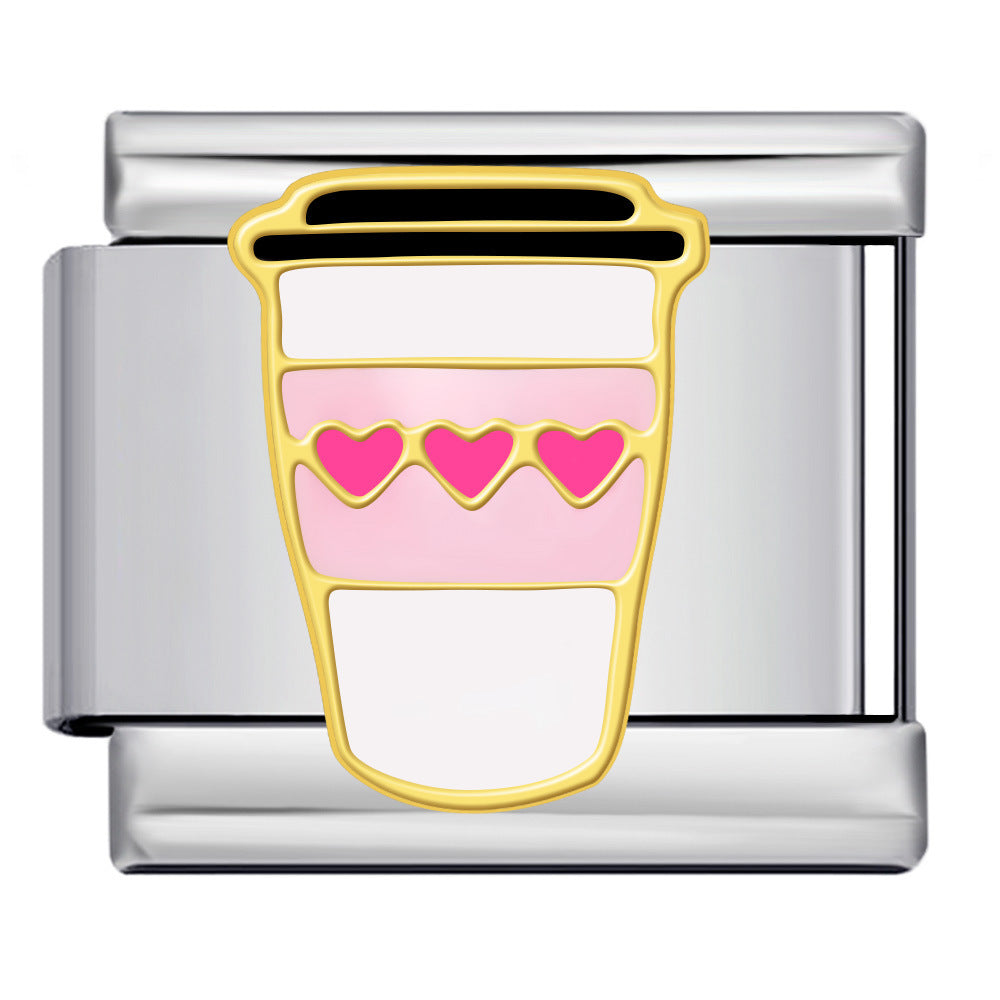 white to-go coffee cup with a black lid and a pink band with three pink hearts