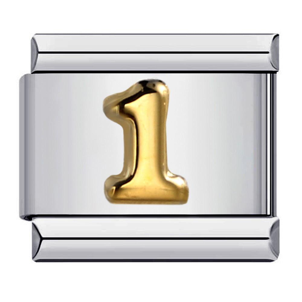 Silver charm with a gold number '1' 