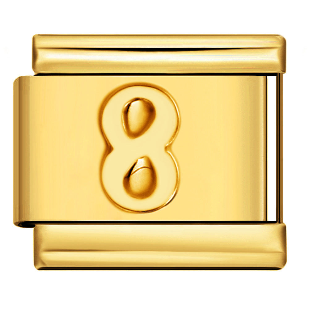 Gold charm with the number 8 in the center