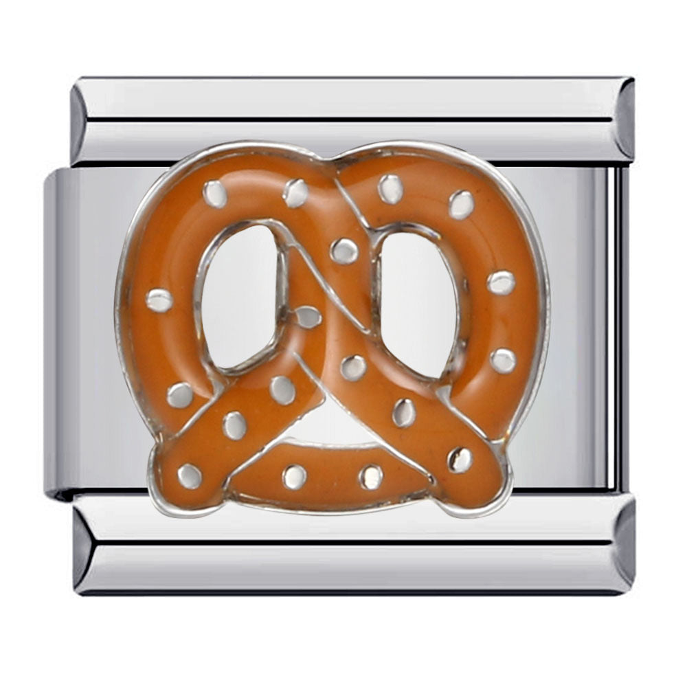 Silver charm with a brown pretzel design
