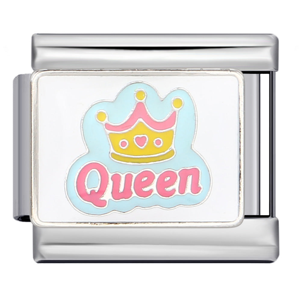 Charm with 'Queen' and crown design in pink, yellow, and light blue on a white background