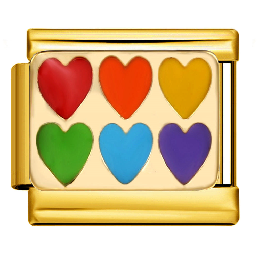 Gold charm with colorful hearts on a gold background