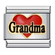 A rectangular silver-toned charm link with a red heart and the word 'Grandma' in gold lettering