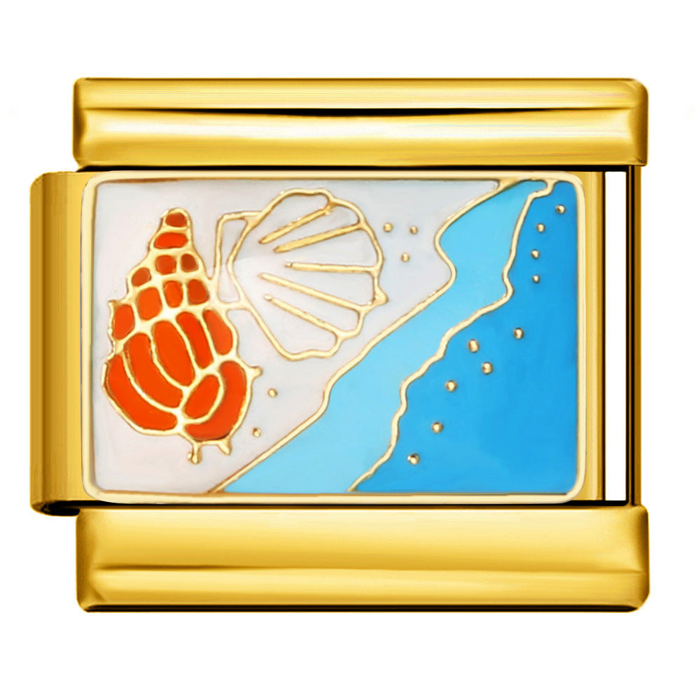 Gold Seashell Shore Italian Charm featuring an orange conch shell, white scallop shell, sandy shoreline, and blue ocean waves with gold accents.