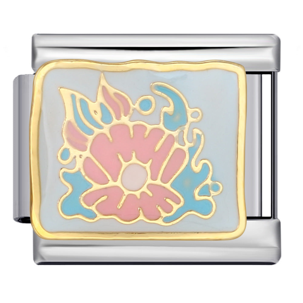 A silver-toned Italian charm link featuring a square enamel inlay with a stylized pink lotus flower and light blue decorative accents outlined in gold.
