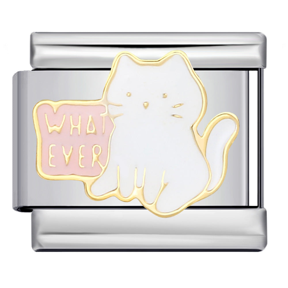 Silver-toned charm with a white cat design and 'Whatever' text on a pink background